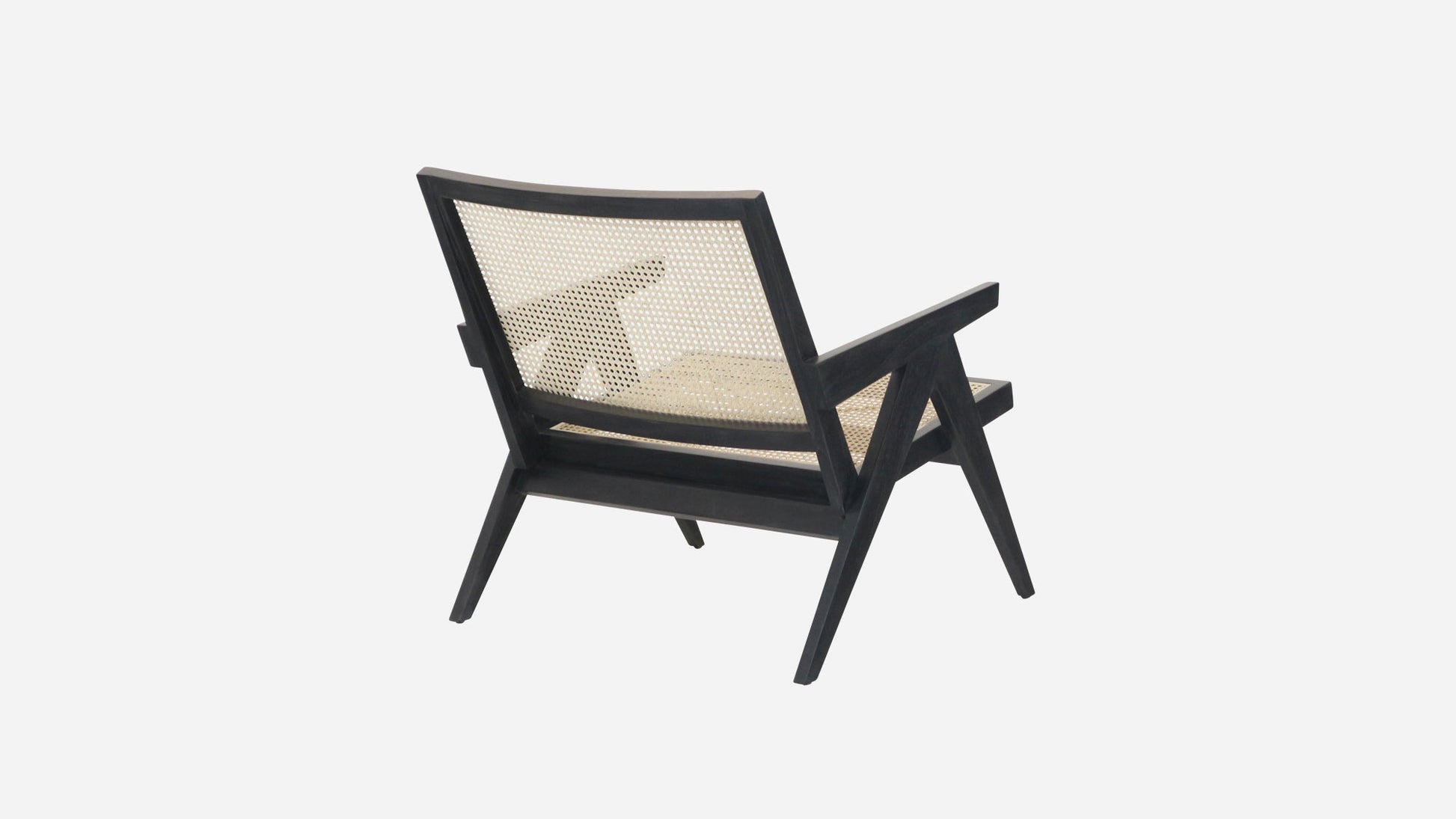 Black rattan lounge chair named Pierre with a modern design, featuring a sturdy frame and comfortable seating.