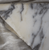 Sample Amarante Viola marble slab from My Store featuring rich purple and gray veining on a polished surface.