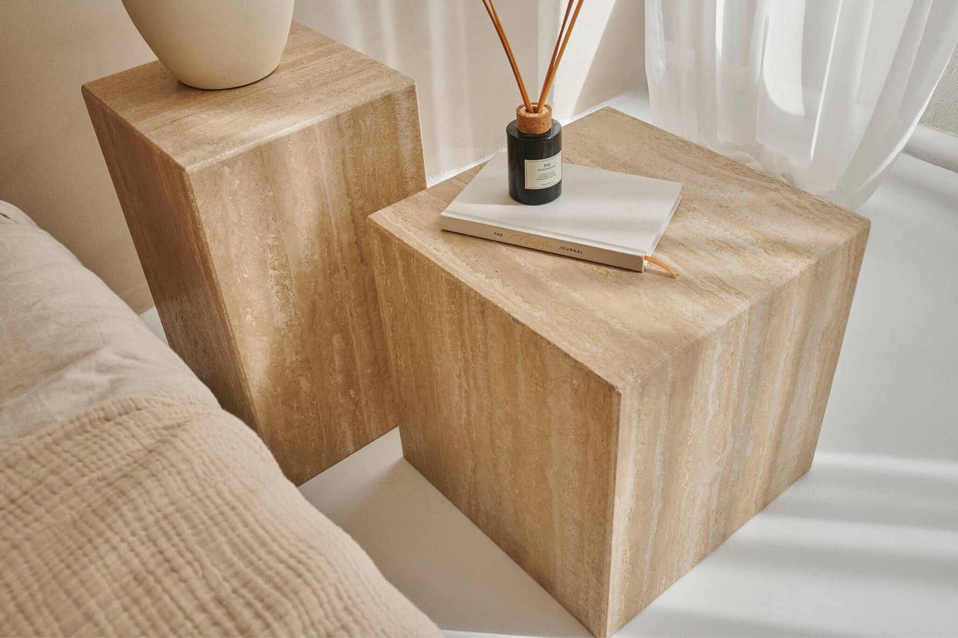 Travertine cube from My Store, showing a smooth, beige natural stone tile with a textured surface for decorative use.