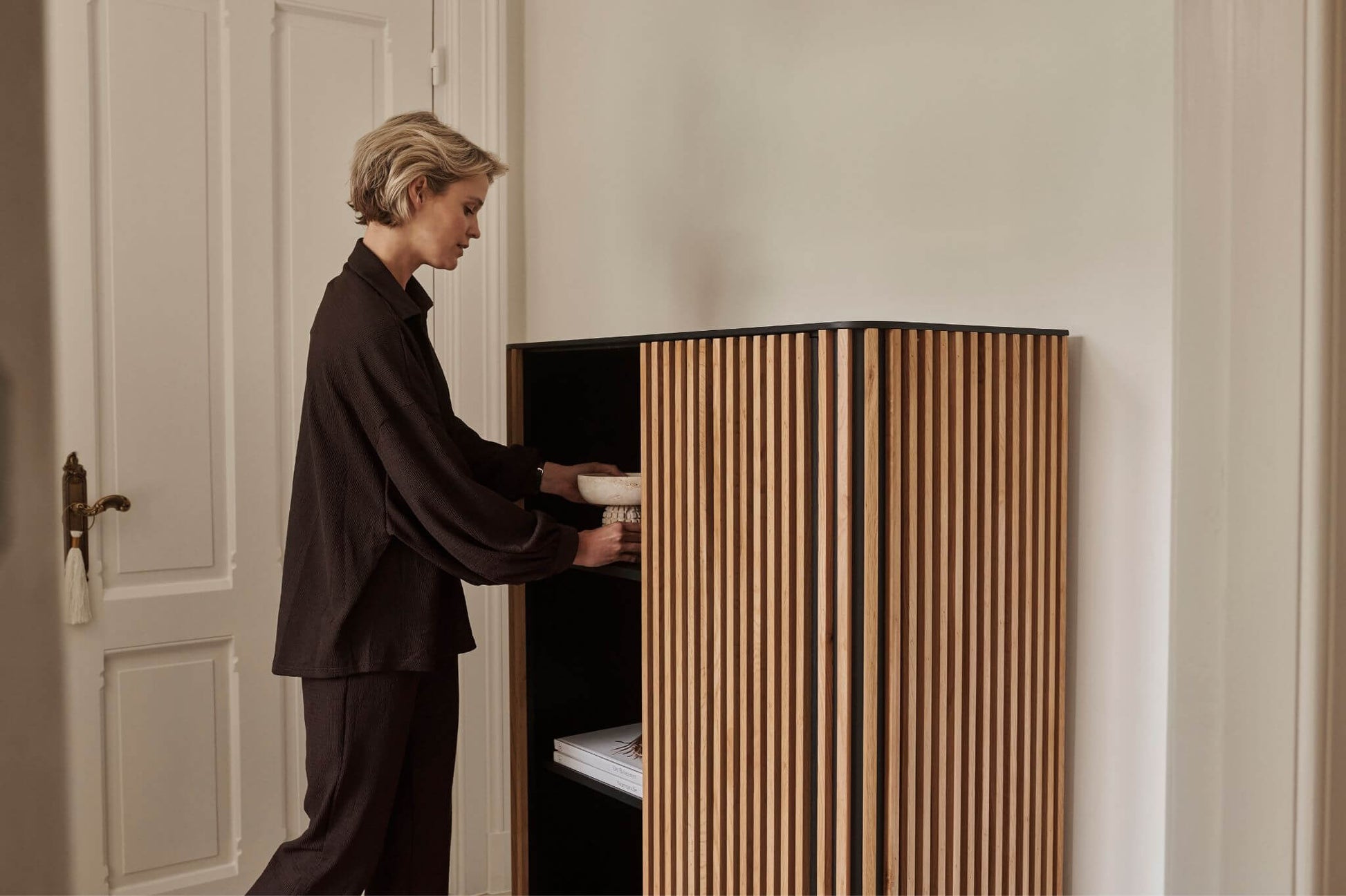 Brown oak ZINIA Cabinet by My Store with sleek wood finish and modern design, featuring multiple storage compartments.