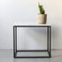 Glossy Bianco Carrara marble side table with sleek design, featuring a smooth white marble surface and modern aesthetic.