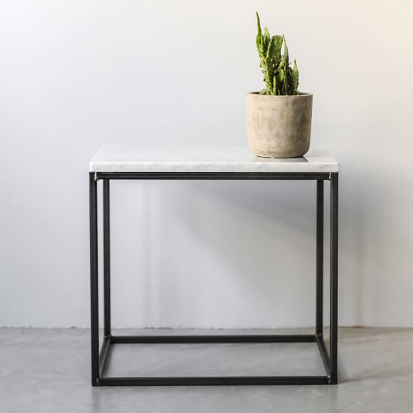 Glossy Bianco Carrara marble side table with sleek design, featuring a smooth white marble surface and modern aesthetic.