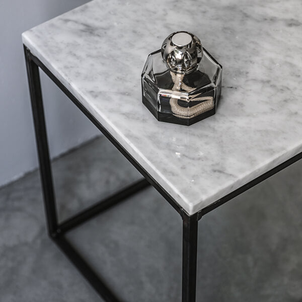 Glossy Bianco Carrara marble side table with sleek white finish, showcasing elegant natural veining and modern design.