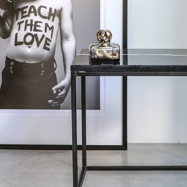Glossy Nero Marquina marble side table with sleek black finish, modern design, and round shape for stylish home decor.