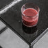 Glossy Nero Marquina black marble side table with sleek, modern design, featuring a smooth surface and sturdy base.