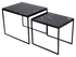 Set of two Nero Marquina black marble side tables with glossy finish, modern design, and sleek round tops.