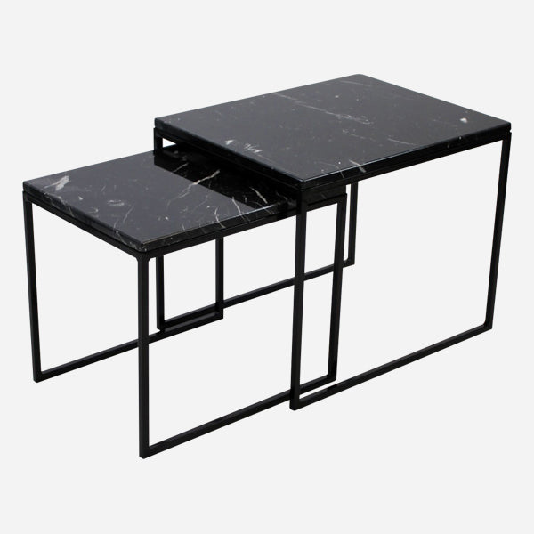 Set of two Nero Marquina black marble side tables with glossy finish, modern design, and sleek black surface.