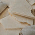 Glossy Crema Marfil marble sample from My Store showing warm beige tones and smooth polished surface.