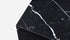 Marble cube made of Nero Marquina black marble with a matte finish, showcasing elegant veining and smooth surfaces.