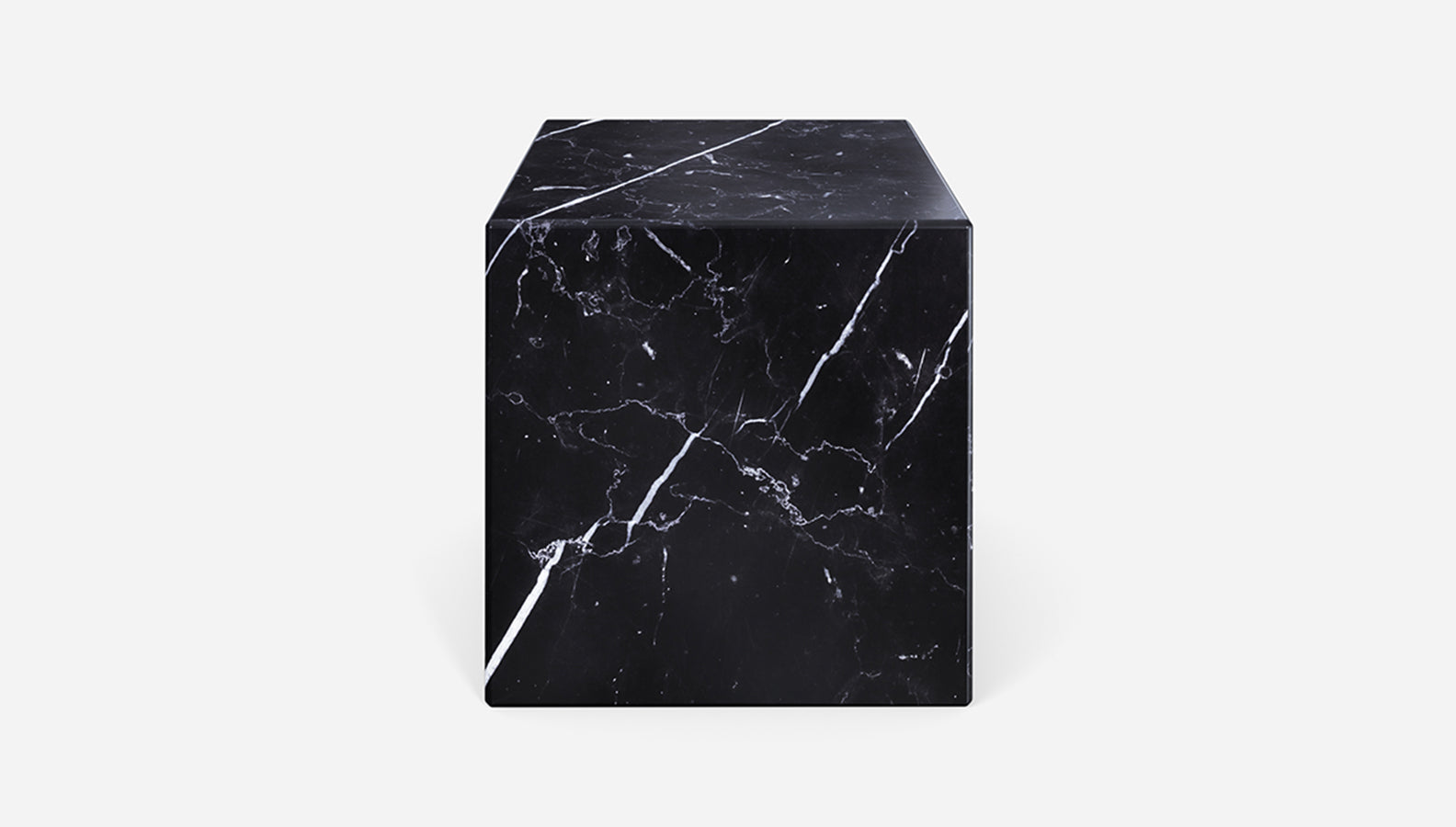 Matte Nero Marquina black marble cube with smooth surface, showcasing elegant natural stone patterns.