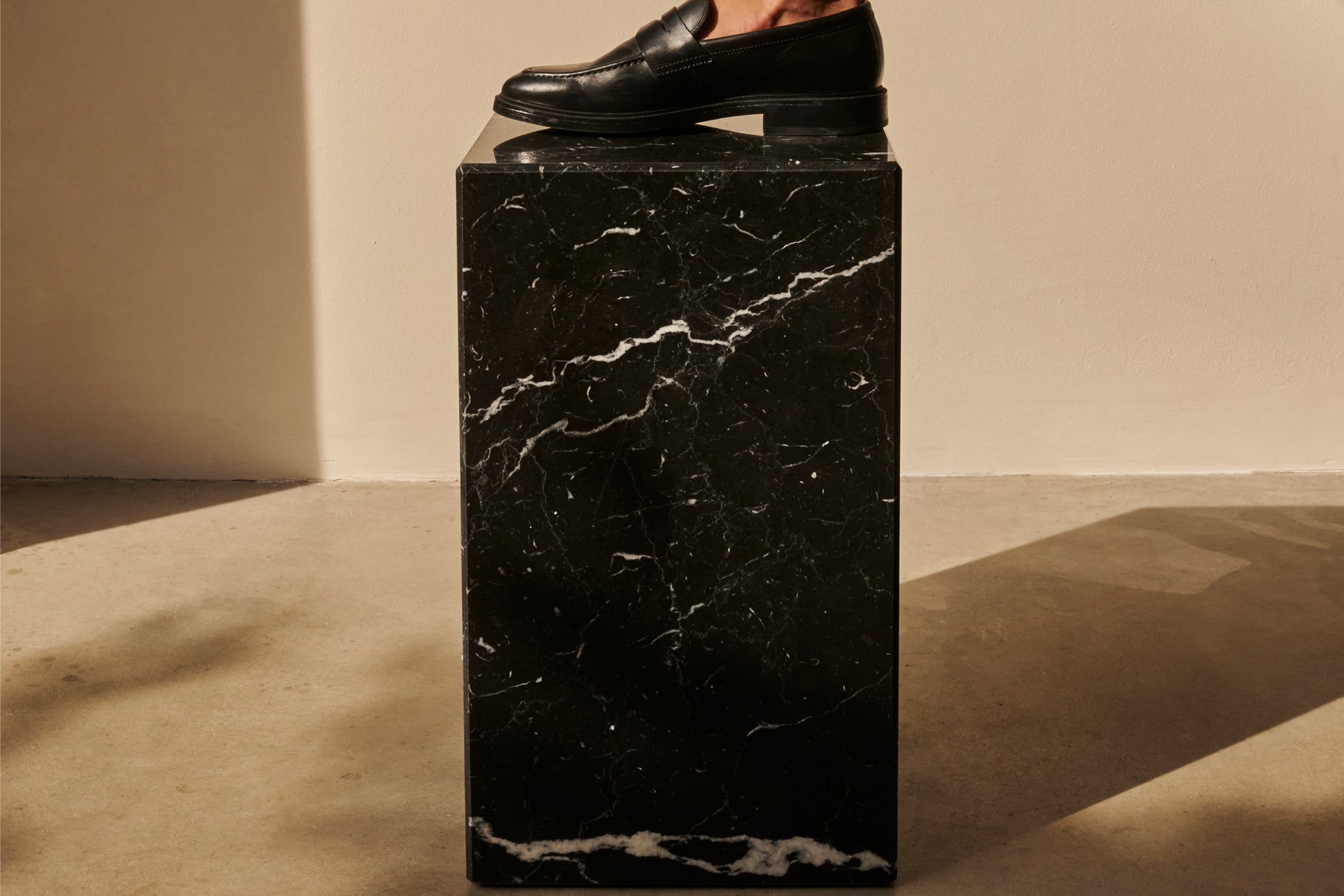 Marble pillar in Bianco Carrara white with matte finish, showcasing elegant marble veining and classical architectural style.