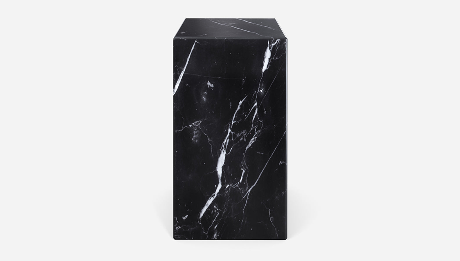 Matte Nero Marquina marble pillar featuring black and white veining, ideal for elegant interior or outdoor decor.