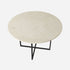 Glossy round marble dining table in Crema Marfil beige with a cross-frame base, by My Store.