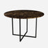 Round marble dining table with dark Emperador brown finish and cross-frame base, glossy surface, for modern dining spaces.