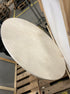 KIYO round dining table in Crema Marfil beige marble with matte finish, 110 cm diameter, minor scratches, excellent condition.