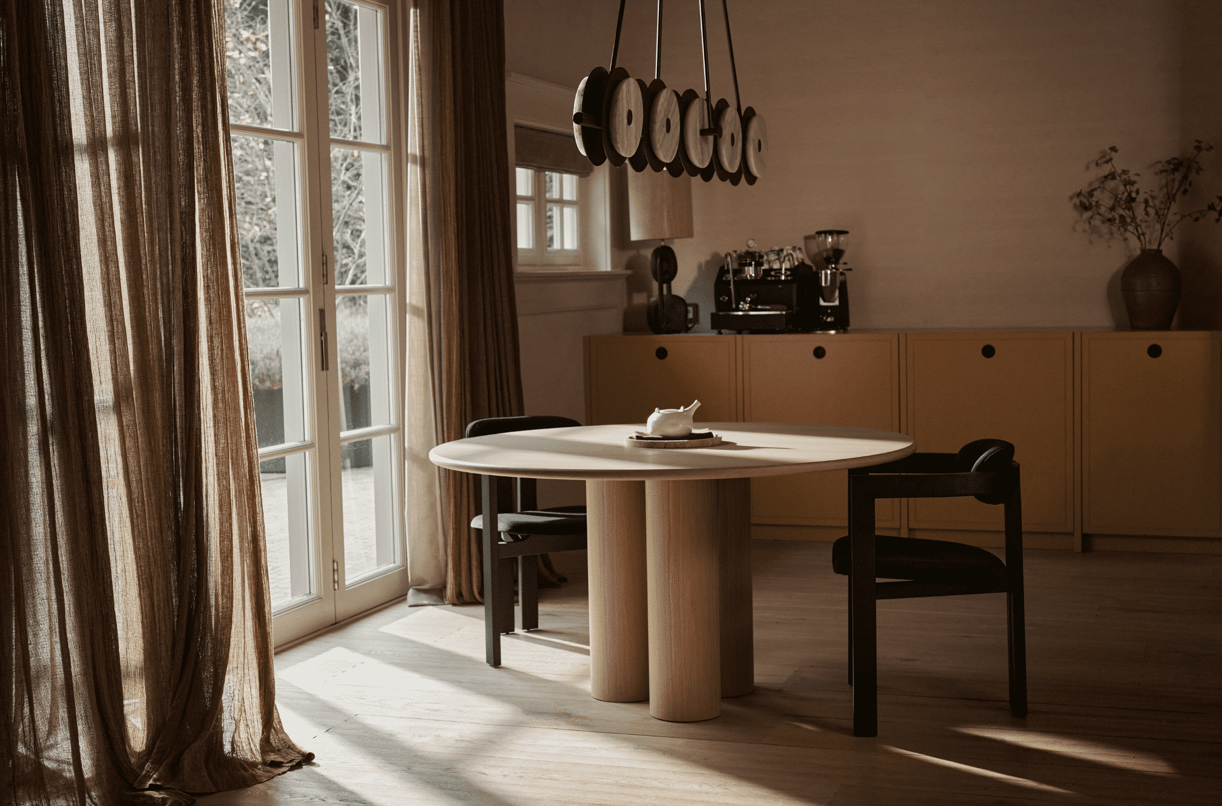 Round dining table with natural oak finish, FRANKY by My Store, showcasing smooth wooden surface and sturdy legs.