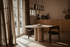 Round dining table with natural oak finish, FRANKY by My Store, showcasing smooth wooden surface and sturdy legs.