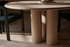 Round dining table with natural oak finish, FRANKY by My Store, showcasing smooth surface and sturdy wooden legs.