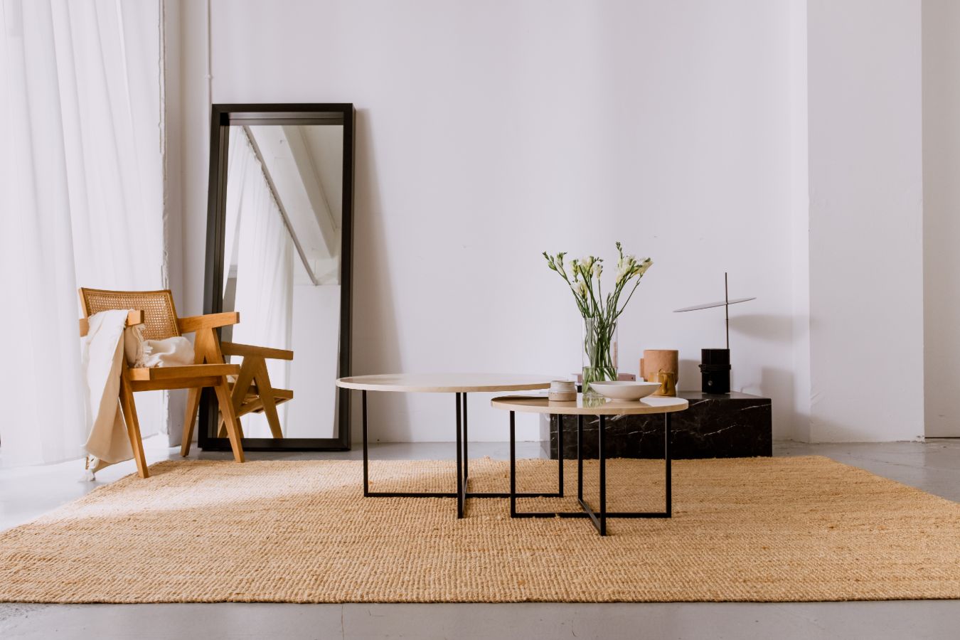 Matte round marble coffee table set in Crema Marfil beige with sleek design, ideal for modern living rooms.