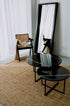 Matte black Nero Marquina marble round coffee table set with sleek, modern design and clean lines.