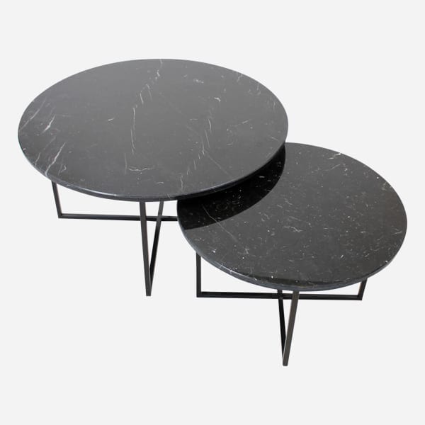 Matte round marble coffee table set in Nero Marquina black with sleek modern design, perfect for contemporary living rooms.