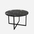 Glossy round Nero Marquina marble coffee table with black finish, featuring a sleek modern design and smooth surface.