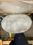 Round marble coffee table in Bianco Carrara white with matte light brown spots and scratches, 60cm diameter, by My Store.