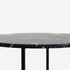 Round Nero Marquina black marble coffee table with glossy finish and subtle surface scratches, modern design from My Store.