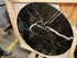 Round Nero Marquina black marble coffee table with glossy finish and subtle scratches, 80cm diameter, by My Store.