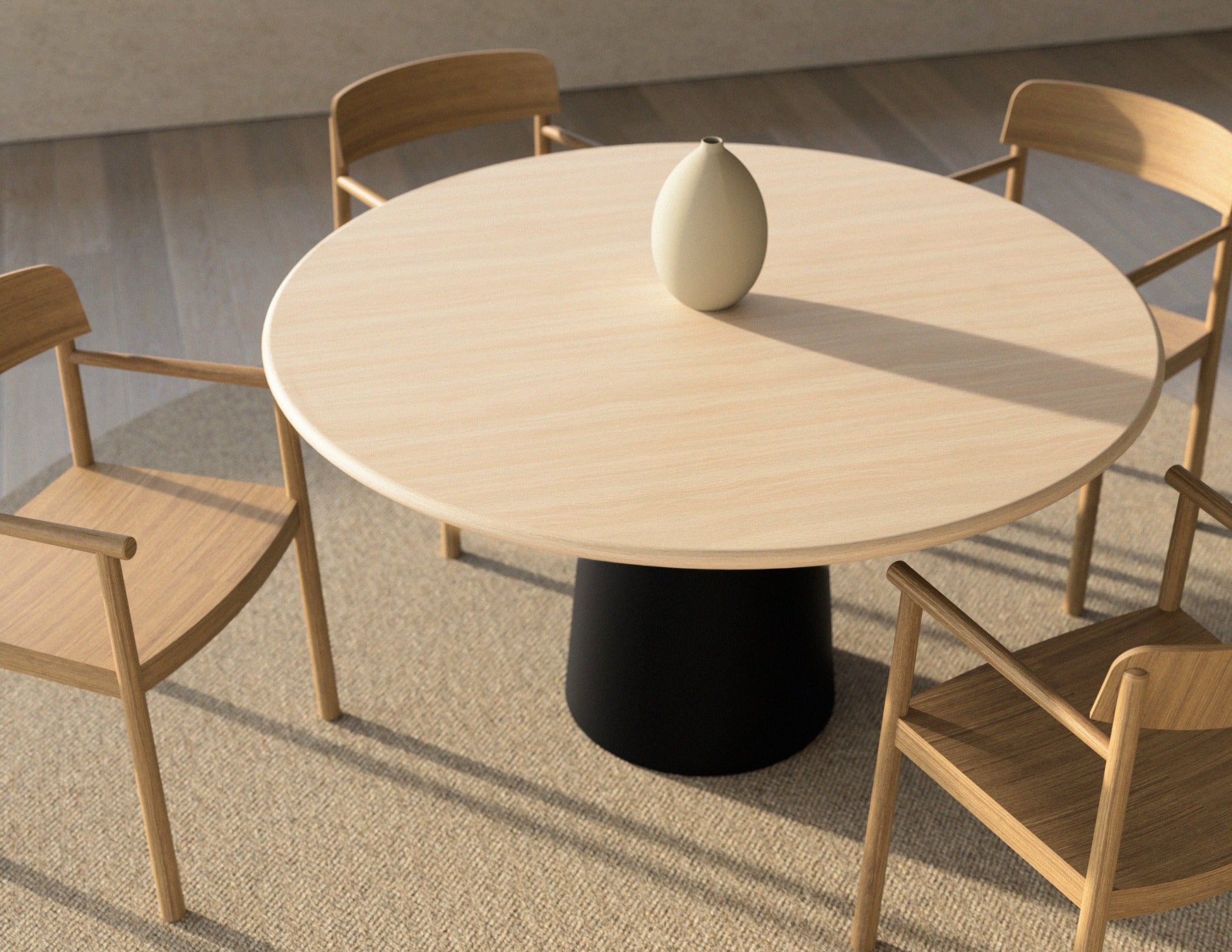 Flow round dining table in Ash White oak with black cylindrical base, slightly worn edge, 140 cm diameter, natural wood finish.