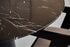 Flow round dining table with Nero Marquina black marble top and black cylindrical base, 110 cm diameter, matte finish.
