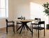 Round oak dining table with ash white finish and arched frame, showcasing a sleek, modern design for dining spaces.