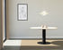 Round oak dining table with ash white finish and central leg, perfect for modern dining rooms.
