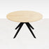 Round oak dining table with natural finish and arched frame, showcasing a sleek, modern design perfect for contemporary dining rooms.