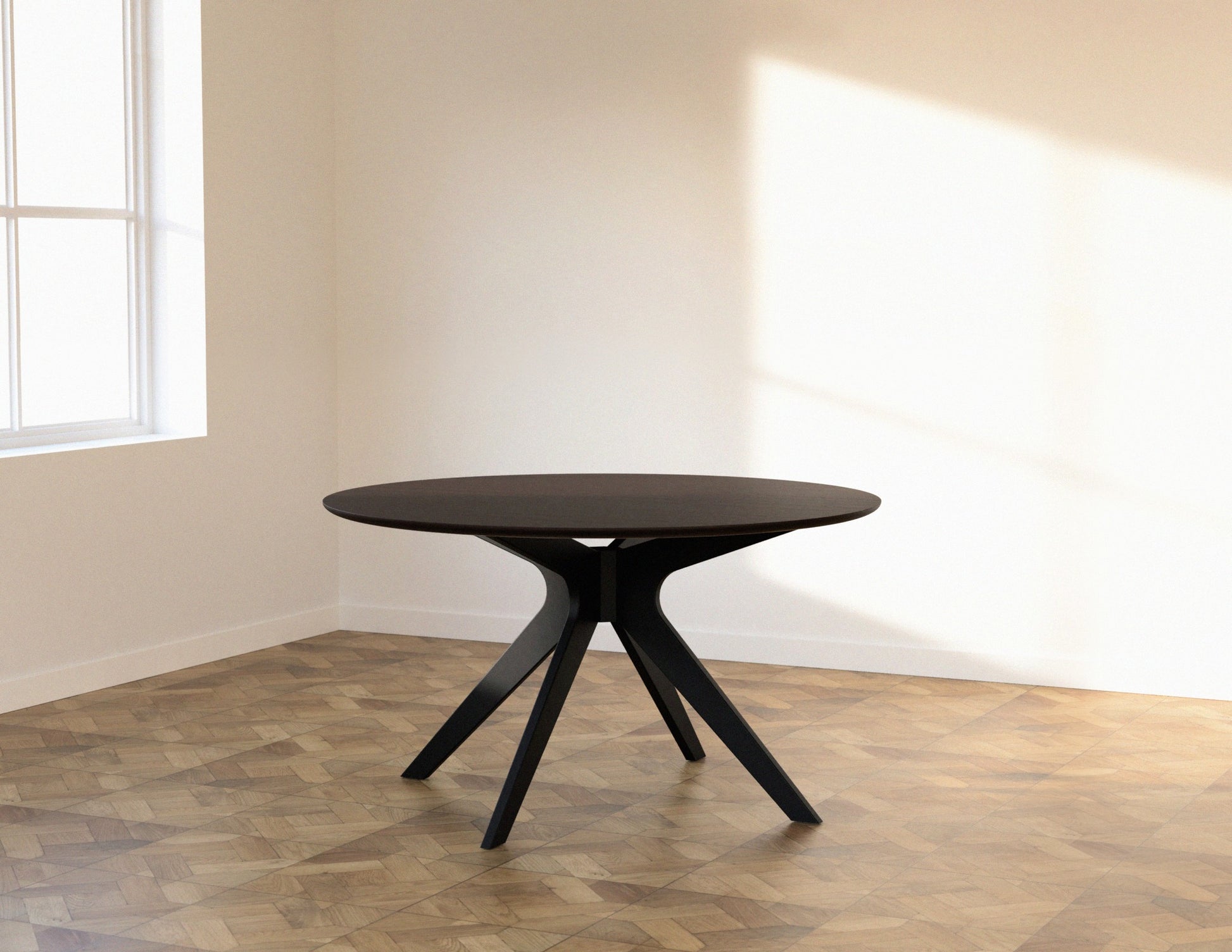 Round walnut dining table with arched frame, showcasing a sleek, modern design and smooth wooden surface.