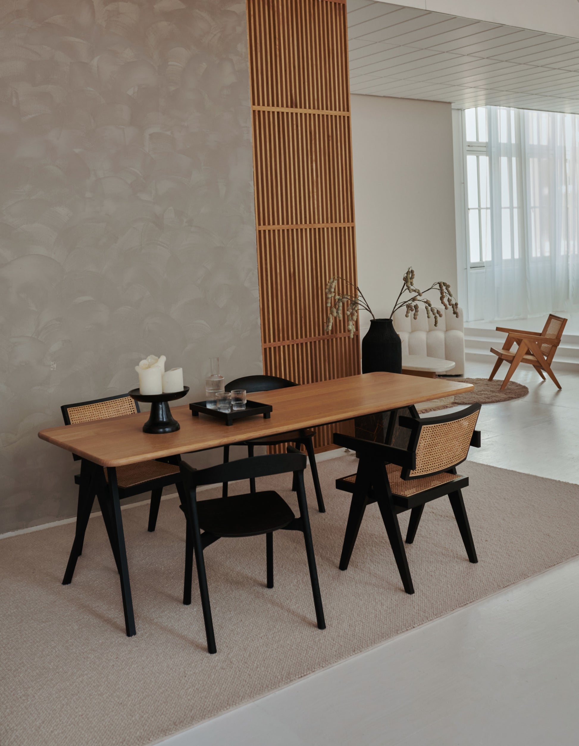 Rectangular oak dining table with charcoal finish and V-frame design, ideal for modern dining rooms.