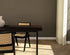 Rectangular walnut dining table with a 4-legged frame, showcasing a sleek wood finish and sturdy design for modern dining rooms.