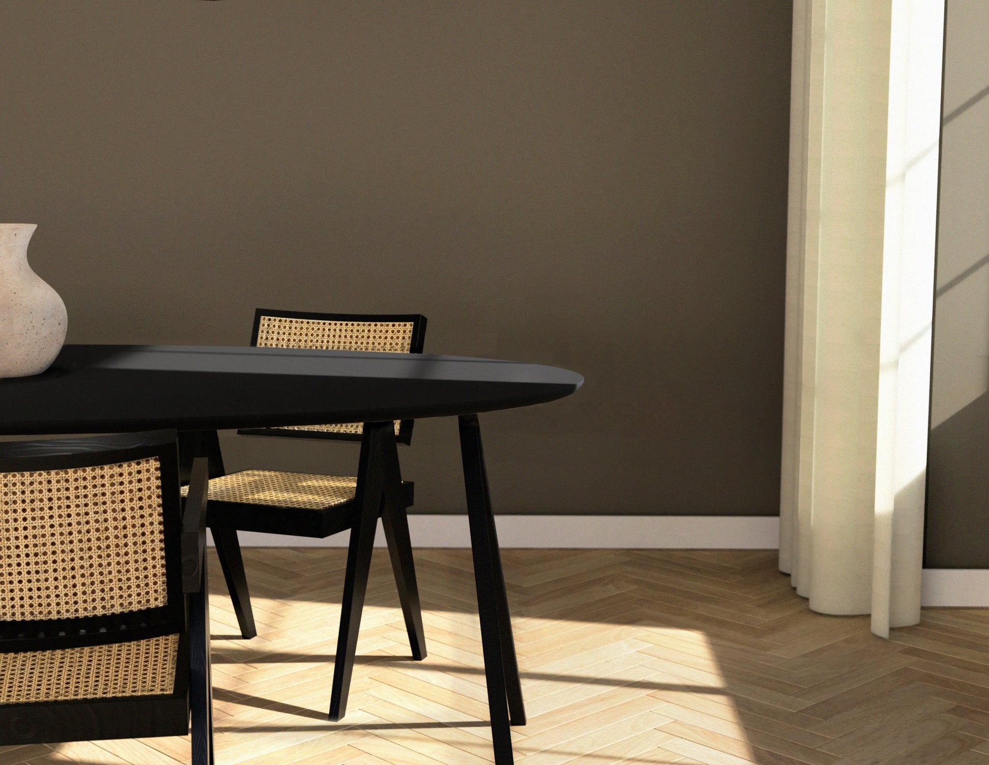 Oval oak dining table with charcoal finish and V-frame design, featuring a sleek, modern style for contemporary dining spaces.