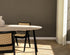 Oval oak dining table with ash white finish and V-frame design, perfect for modern dining rooms.