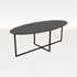 Oval oak dining table with charcoal finish and cross frame, showcasing a sleek, modern design perfect for contemporary dining spaces.