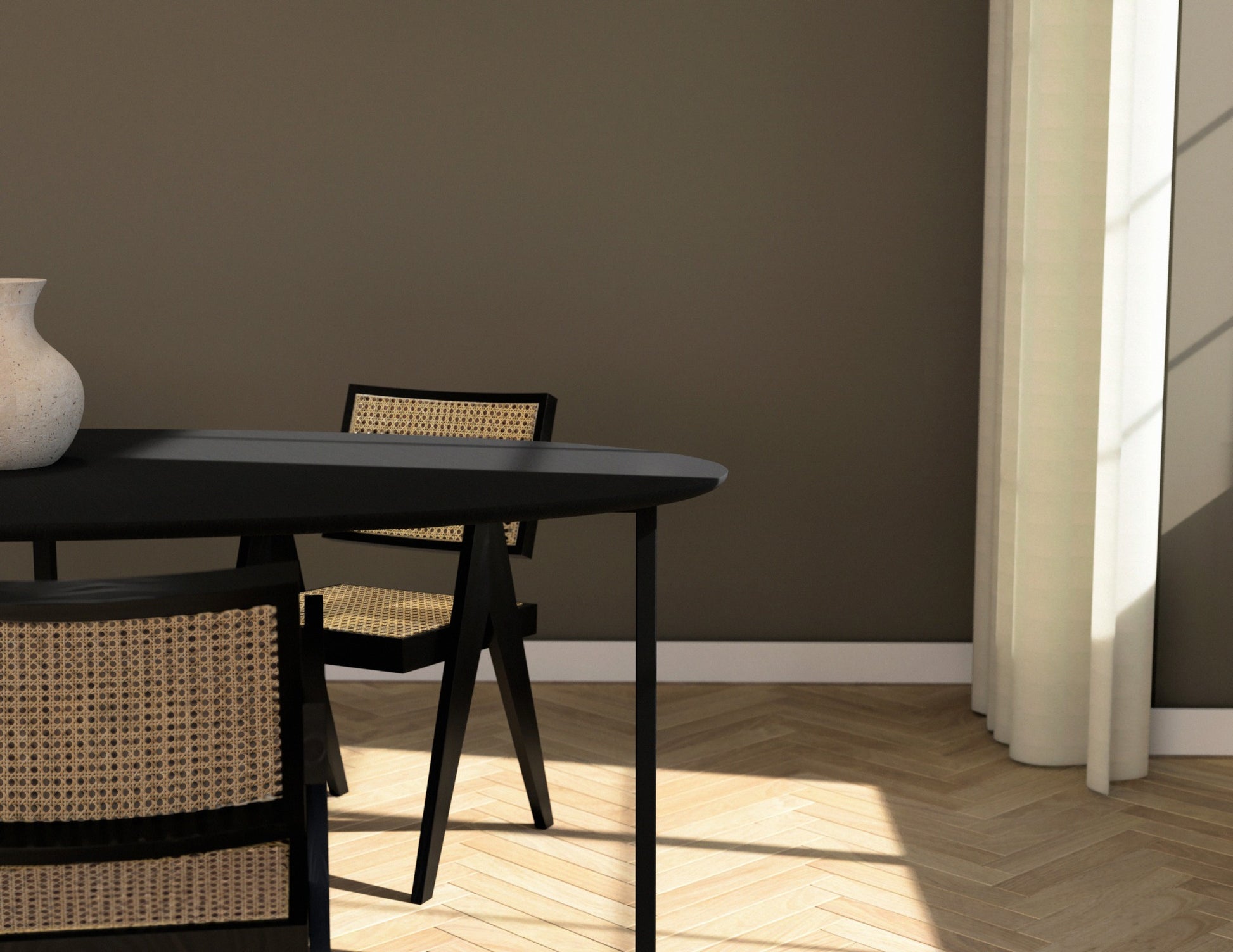 Oval oak dining table with a charcoal finish and cross frame design, showcasing the sleek wooden surface and sturdy base.