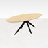 Oval oak dining table with natural finish and arched frame, showcasing a sleek, elegant design for modern dining spaces.