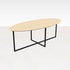 Oval oak dining table with natural finish and cross frame design, showcasing a sturdy wooden table for dining room use.