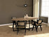 Oval oak dining table with natural finish and cross frame design, showcasing sturdy wooden construction and elegant shape.