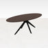 Oval walnut dining table with arched frame, showcasing smooth wood finish and sturdy design for modern dining spaces.