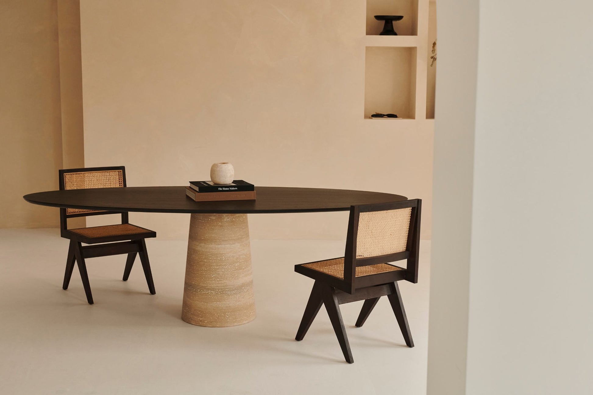 Oval FLOW dining table in smoked oak with travertin cylinder base, modern and sleek design by My Store.