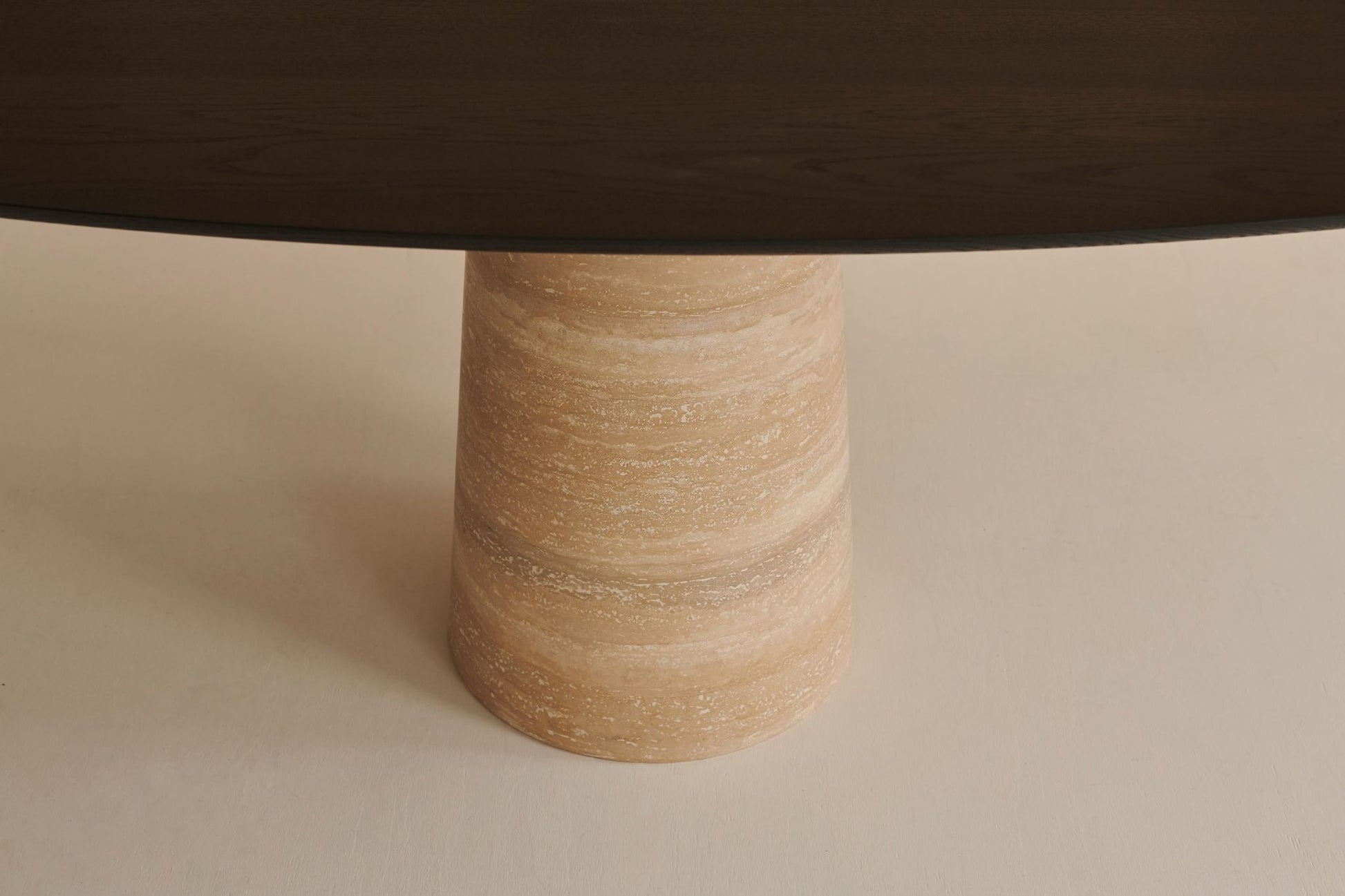 Oval FLOW dining table by My Store with smoked oak surface and travertin cylinder base, measuring 180 x 90 cm.