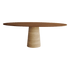 Oval Walnut FLOW dining table with travertine cylinder base, featuring a sleek modern design and smooth surface.