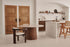 Flow round dining table by My Store with Crema Altea marble top and black cylindrical base, modern and elegant design.